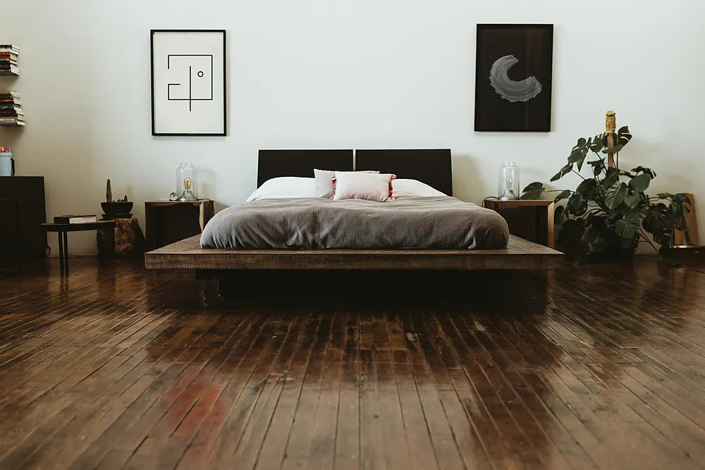 Dark-stained hardwood floor in a Sioux Falls, SD bedroom