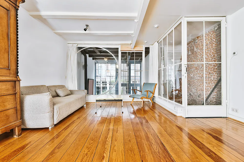 Golden oak hardwood floor running through a Sioux Falls, SD loft space