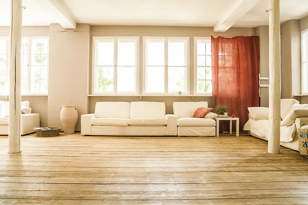 Light plank hardwood floor in a spacious Sioux Falls, SD living room