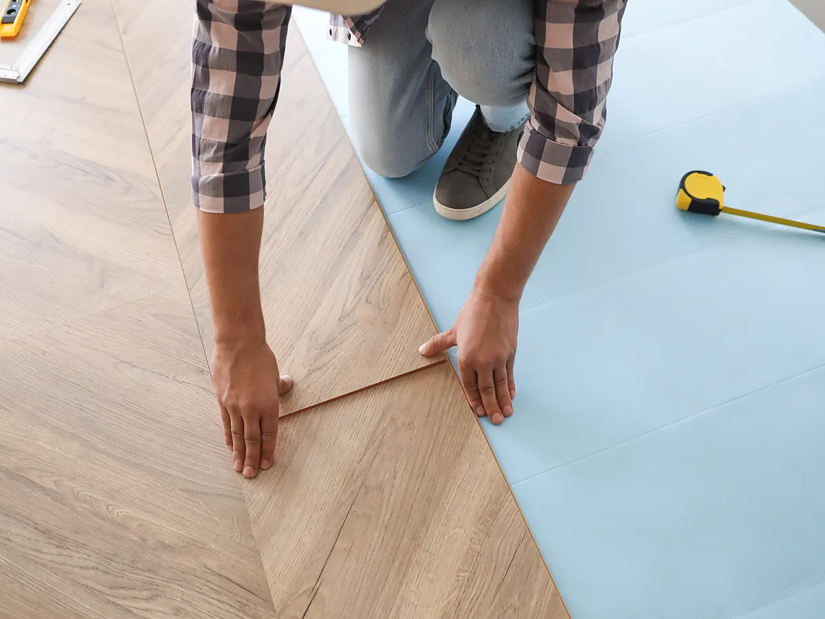 Waterproof luxury vinyl plank laid over foam underlayment in a Sioux Falls, SD lower level