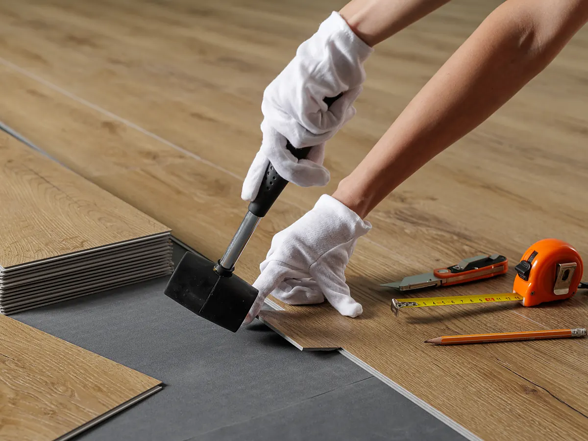 Factory-finished prefinished hardwood boards and installation tools in a Sioux Falls, SD home