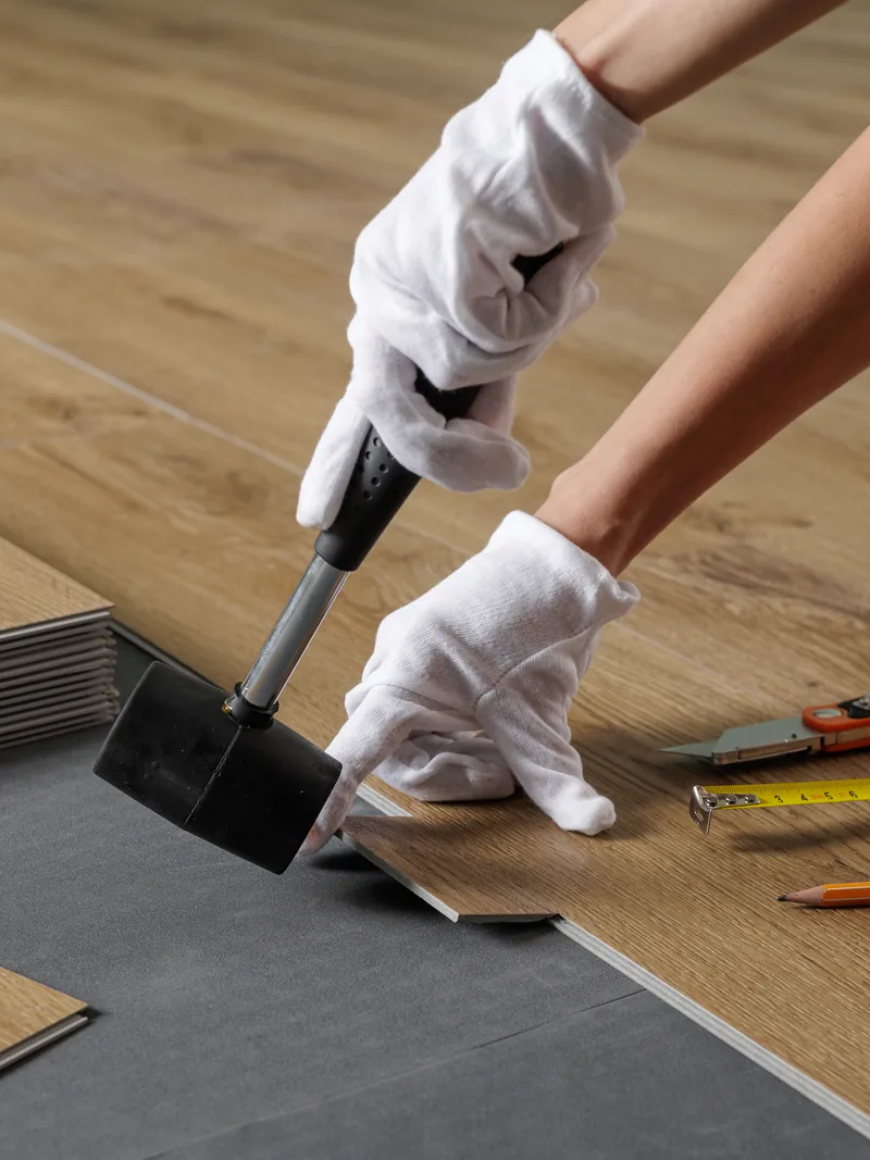Factory-finished prefinished hardwood boards and installation tools in a Sioux Falls, SD home