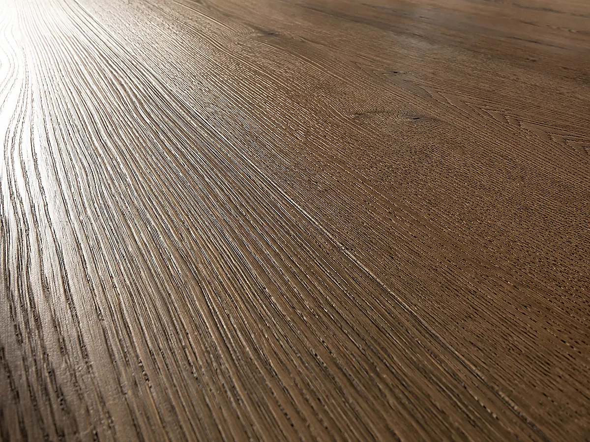 Wire-brushed oak floor with the softer early wood brushed out into grooves along the grain